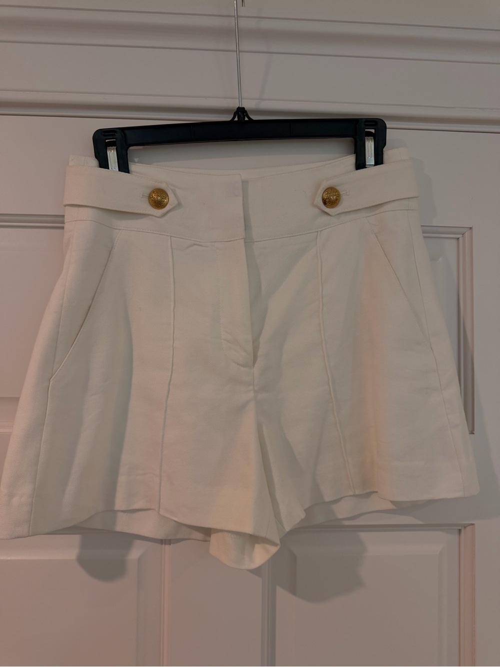 Veronica Beard Ivory High-Waist Pleated Shorts with Gold Buttons
